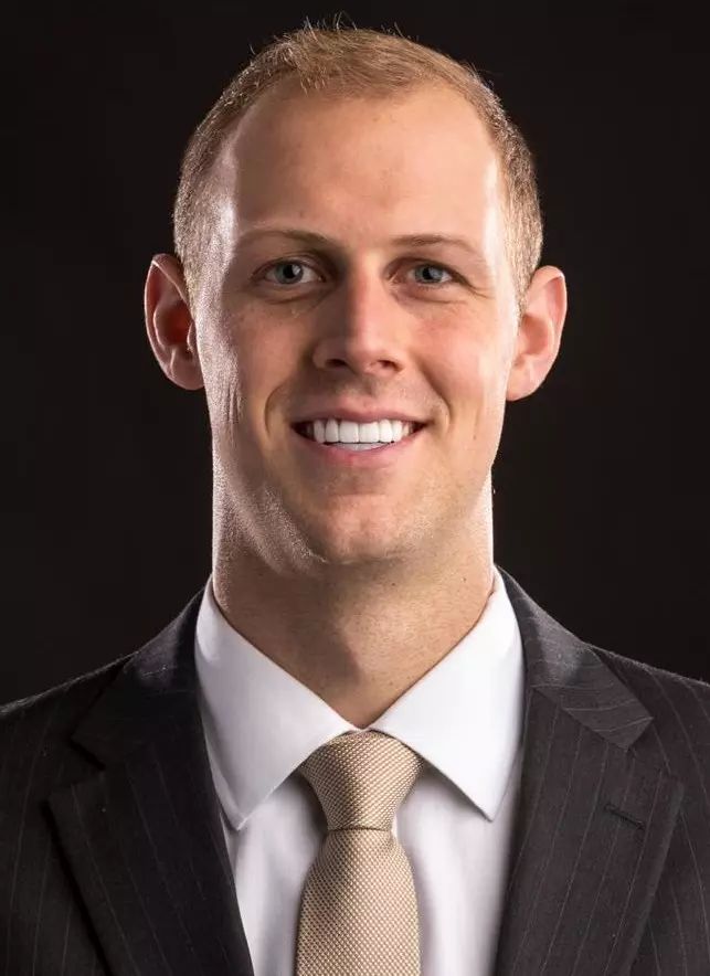 Headshot of Coach Isaac Neilson